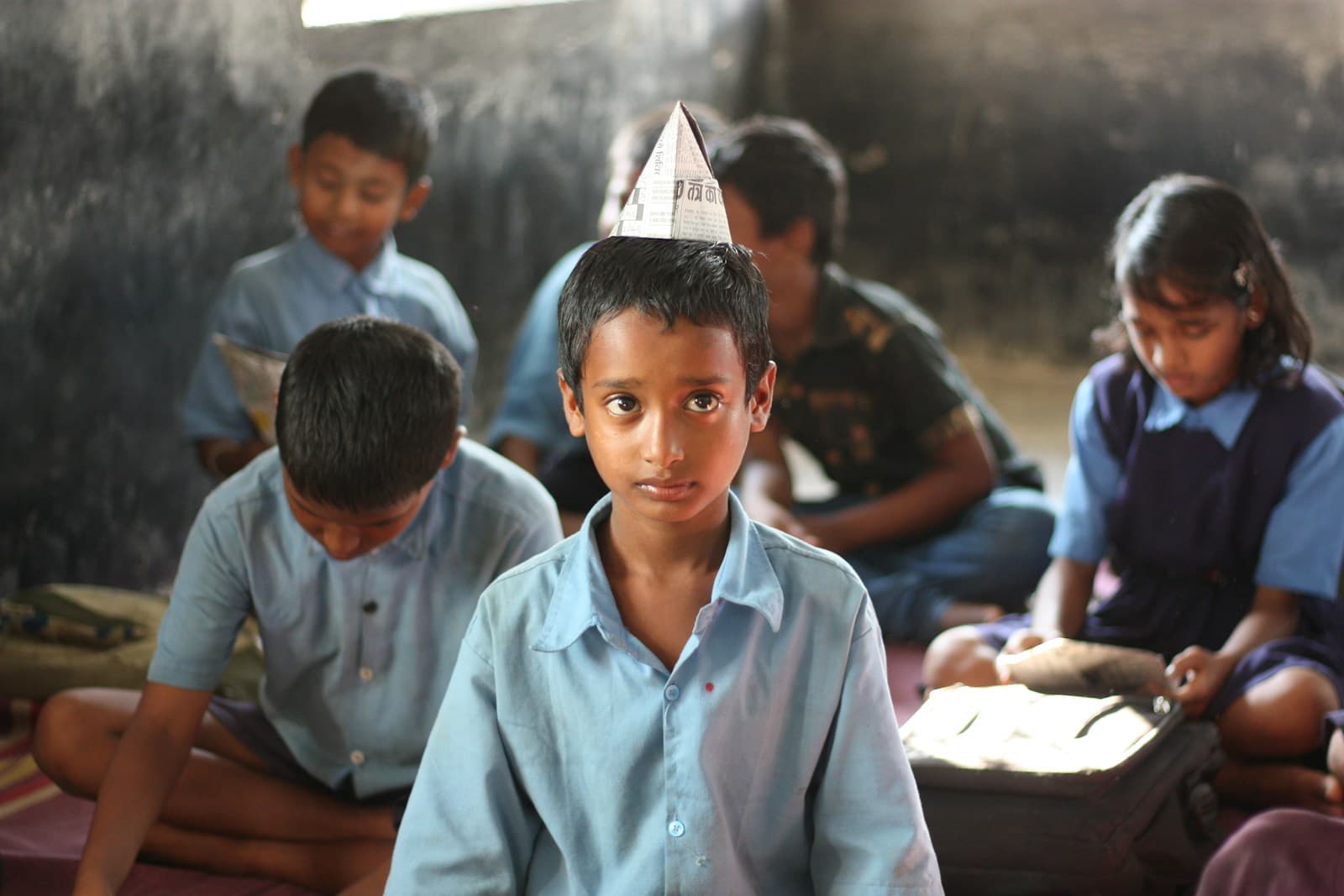 Schoolchildren sitting together in an Indian classroom