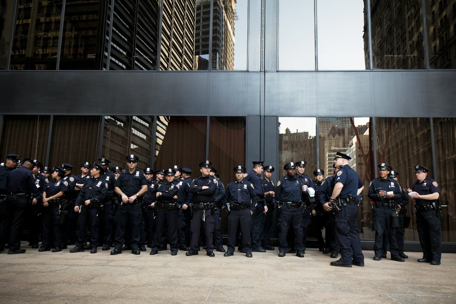 Uniformed police officers outside a building
